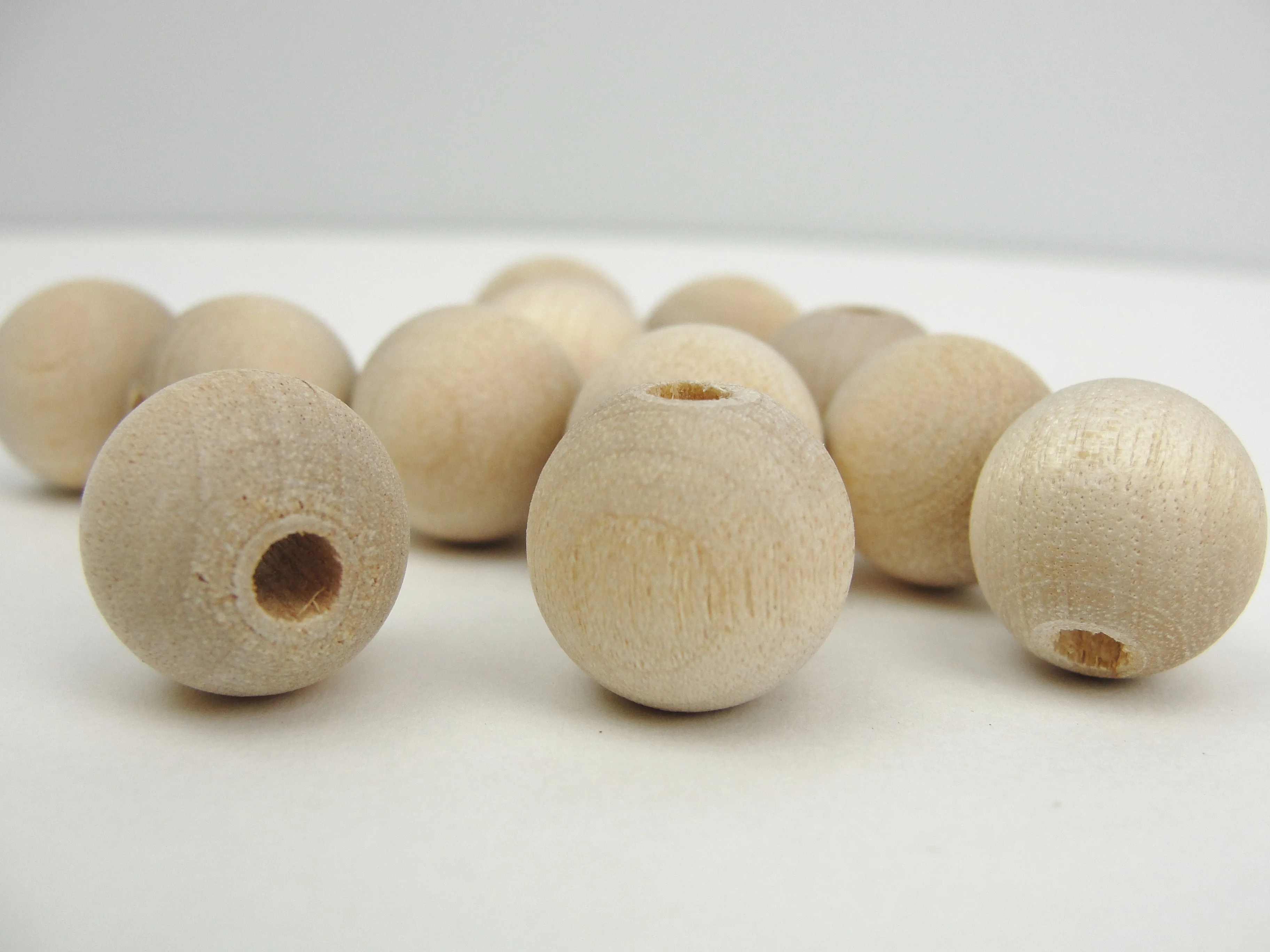 14mm unfinished round wooden beads 9/16" (.56") with 5/32" hole