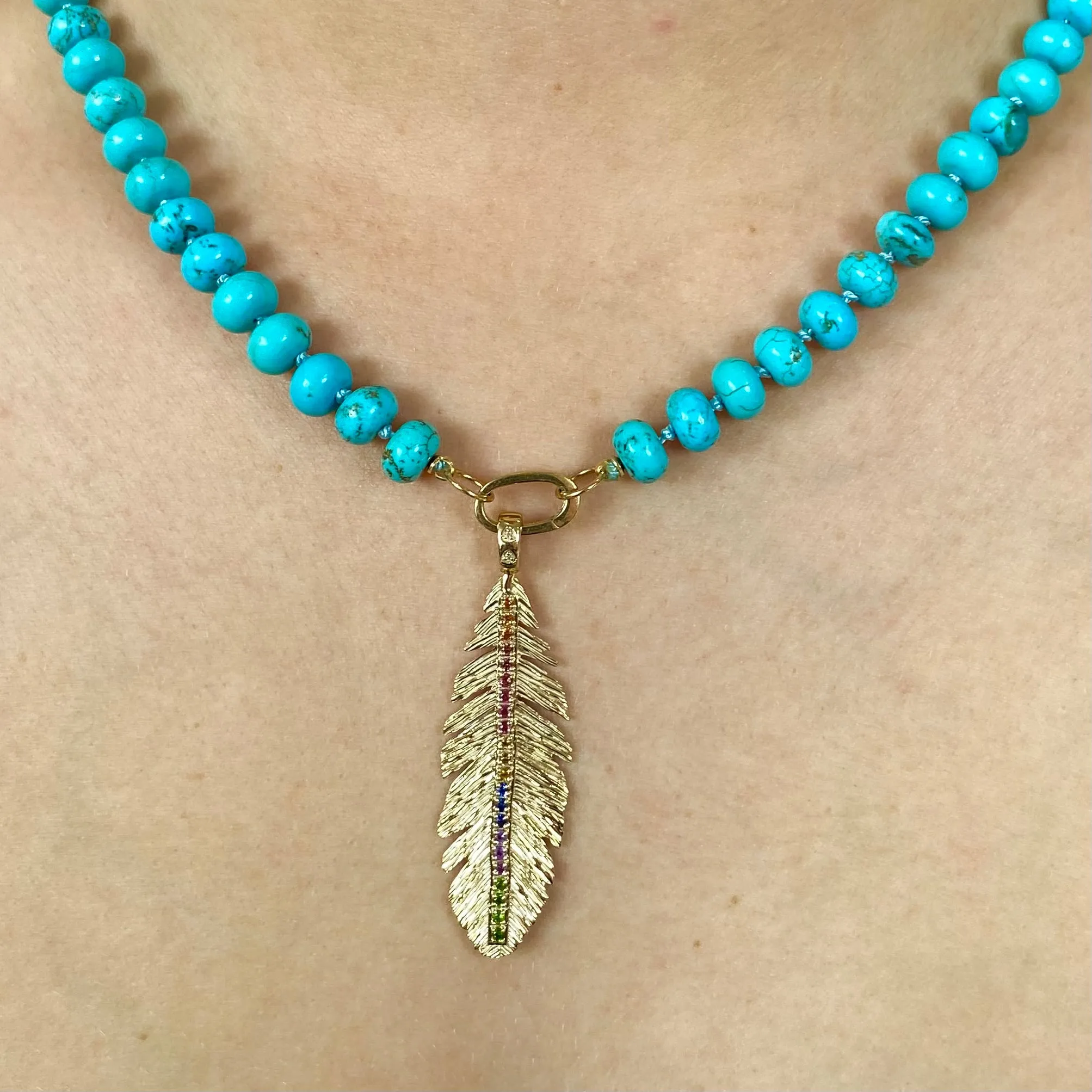 Gold Feather with Rainbow Gemstones