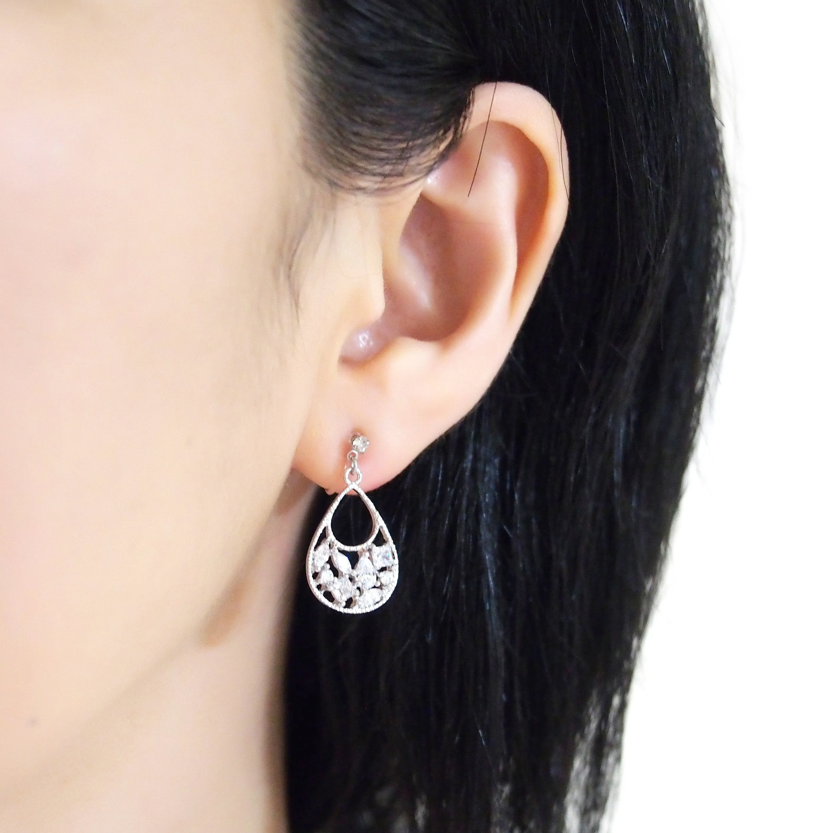 Teardrop filigree cubic zirconia invisible clip on earrings (silver tone)