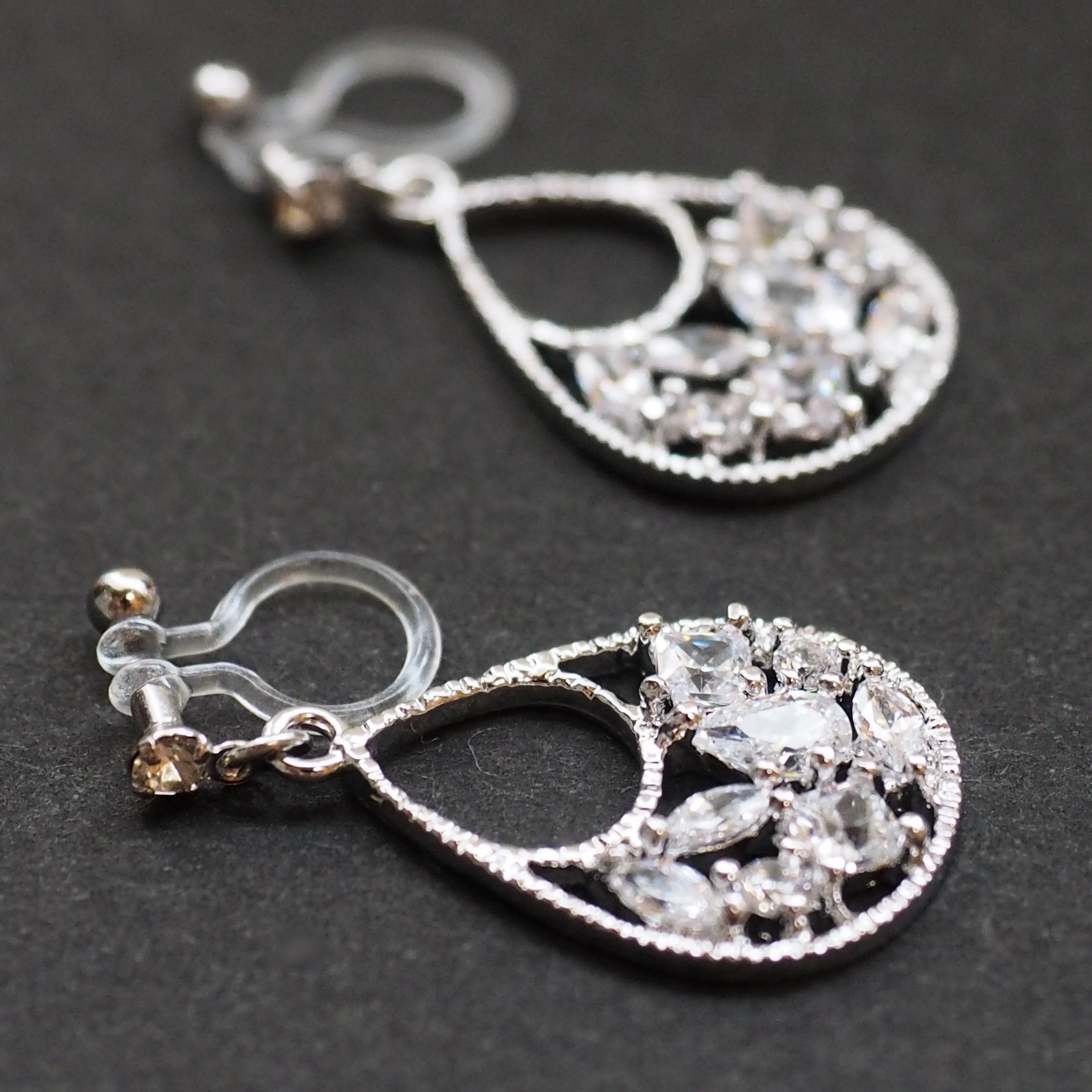 Teardrop filigree cubic zirconia invisible clip on earrings (silver tone)