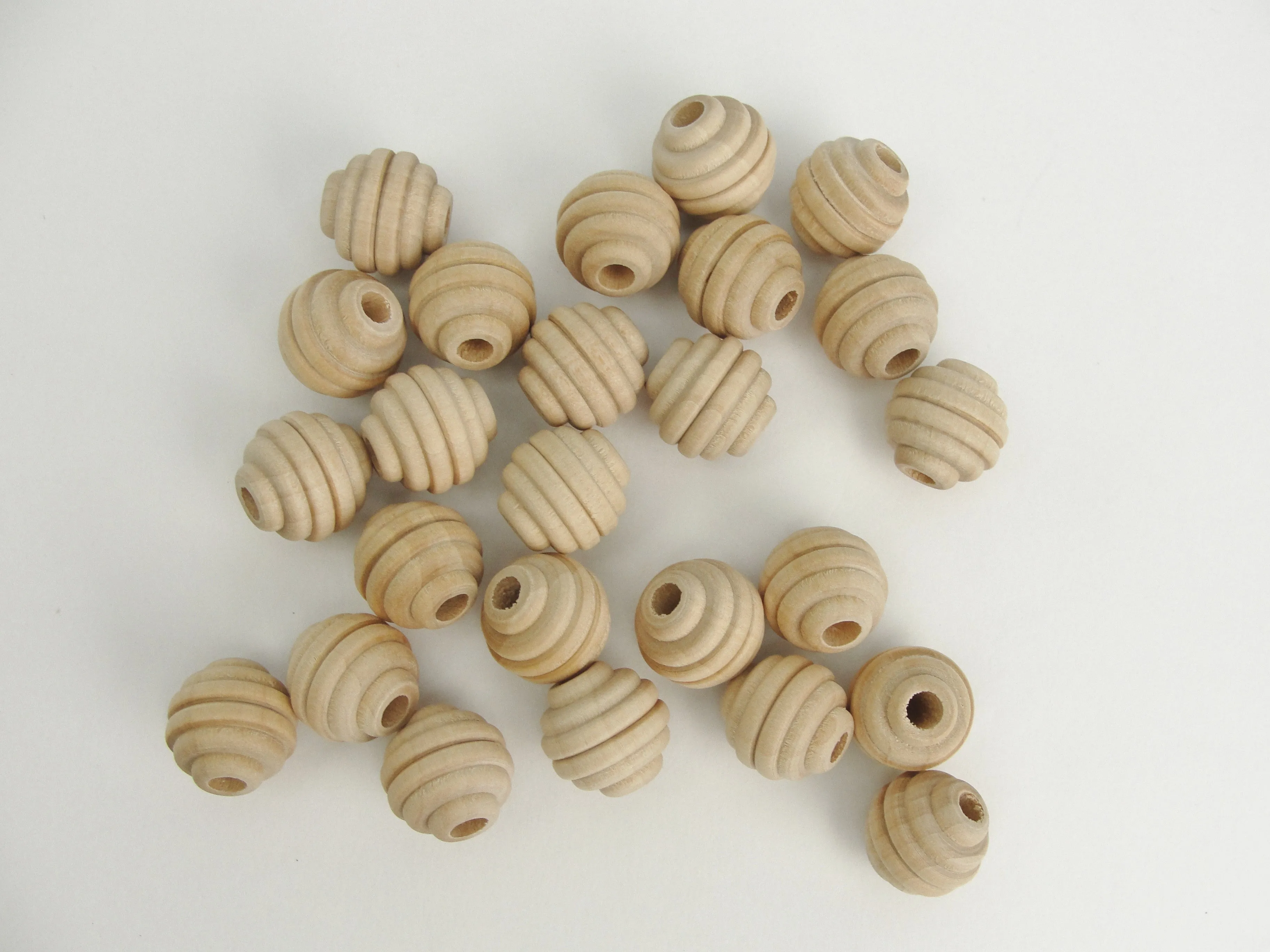 Wood beehive beads 5/8" with a 3/16" hole