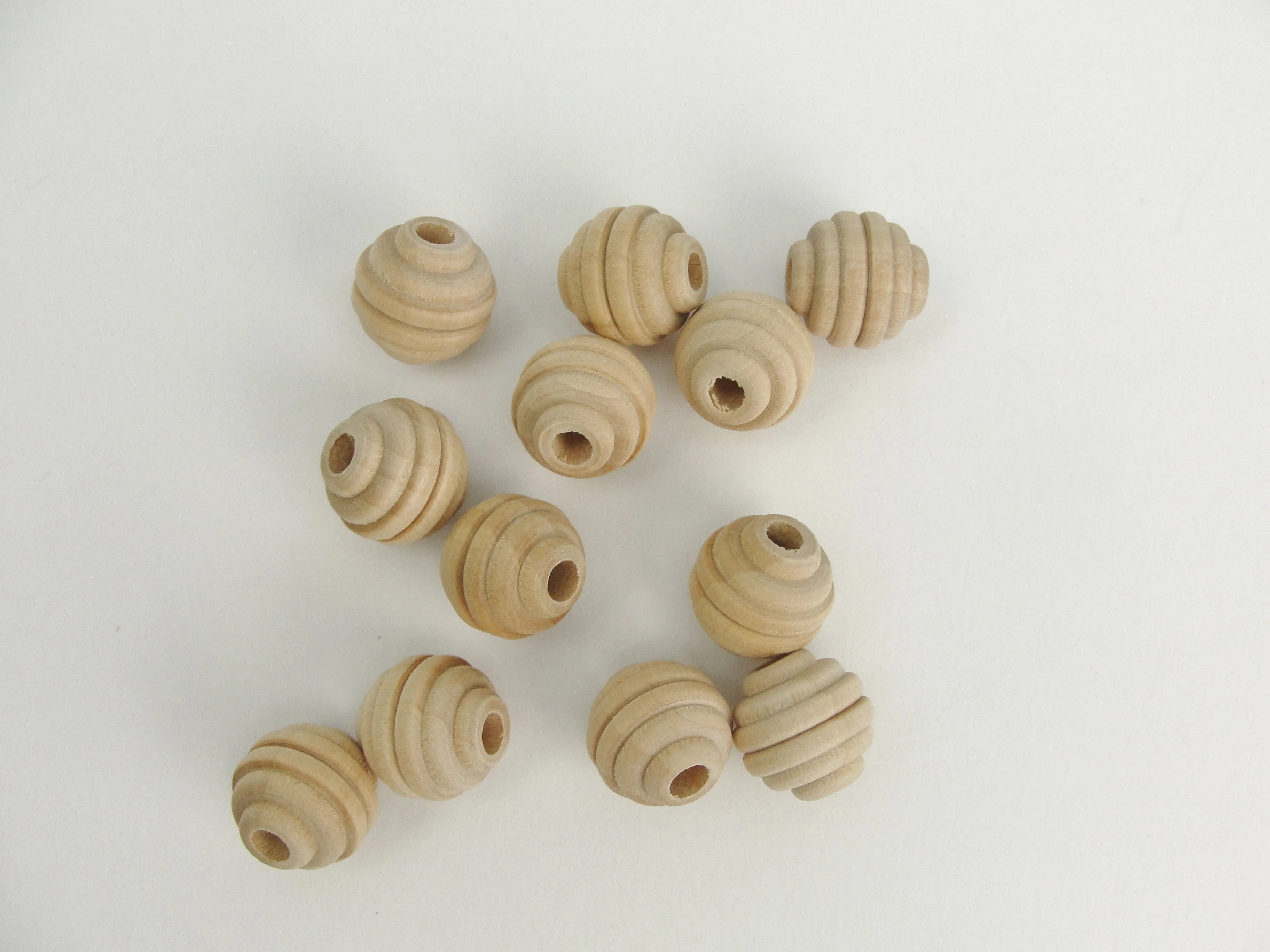Wood beehive beads 5/8" with a 3/16" hole