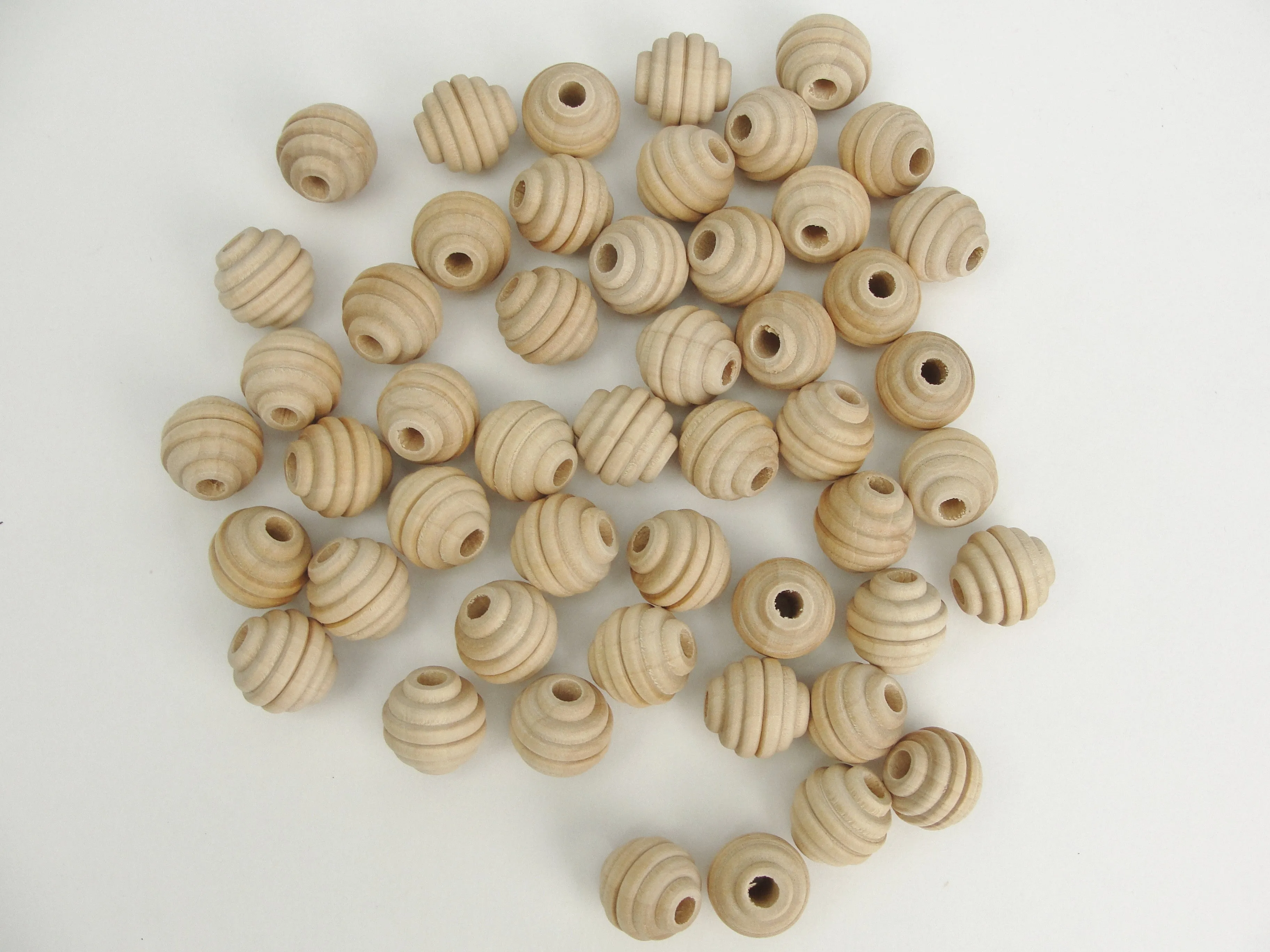 Wood beehive beads 5/8" with a 3/16" hole