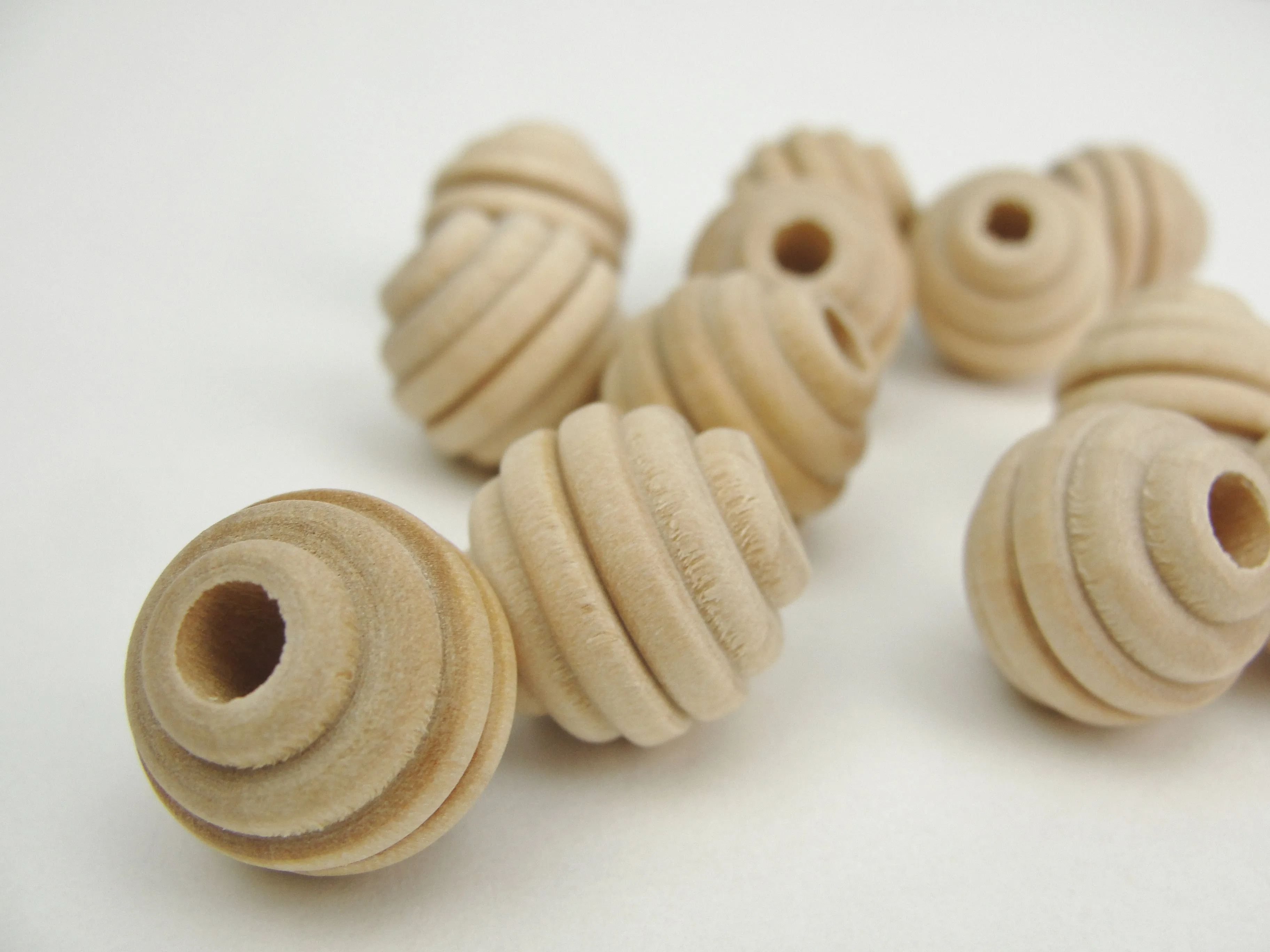 Wood beehive beads 5/8" with a 3/16" hole
