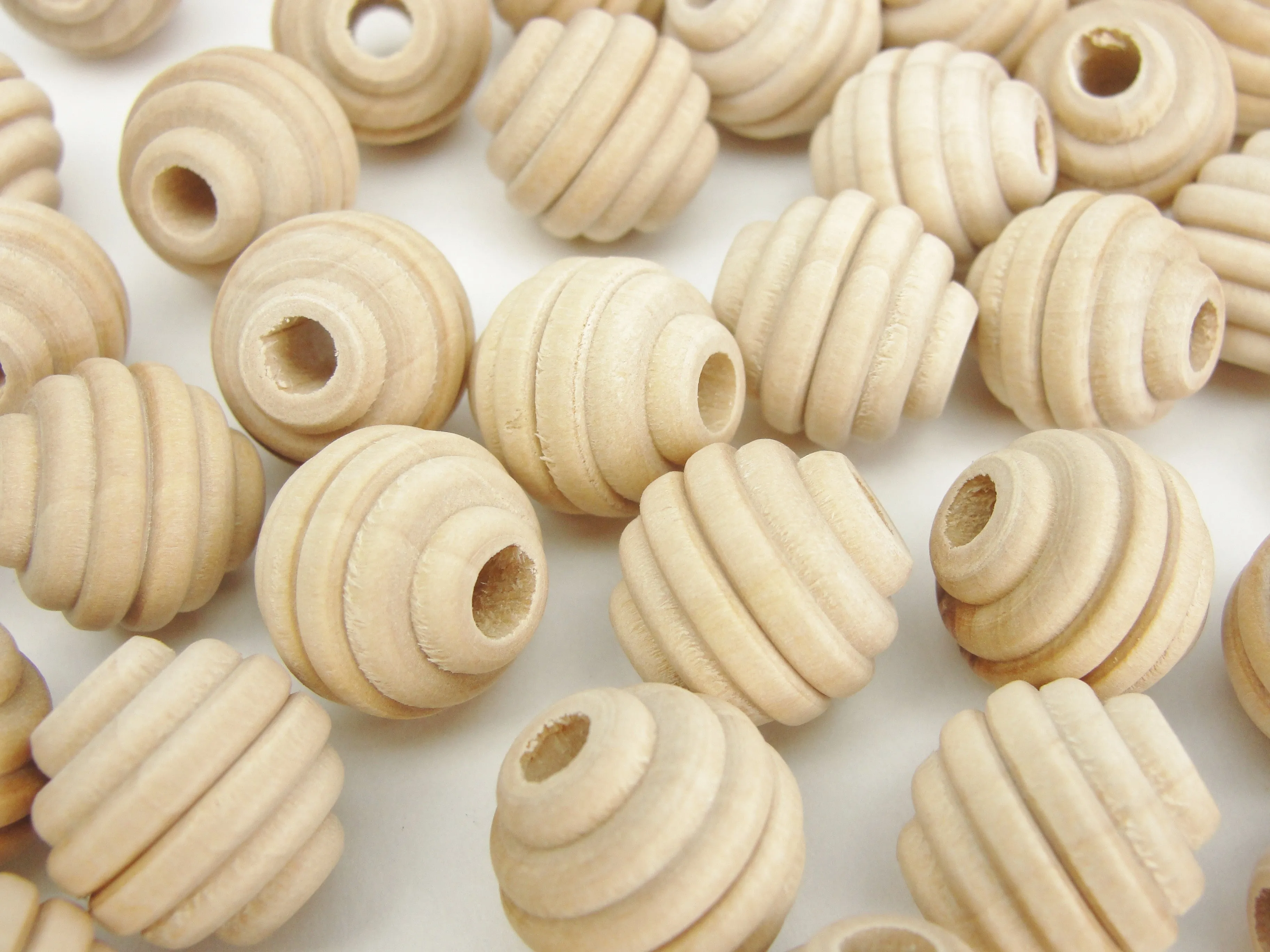 Wood beehive beads 5/8" with a 3/16" hole