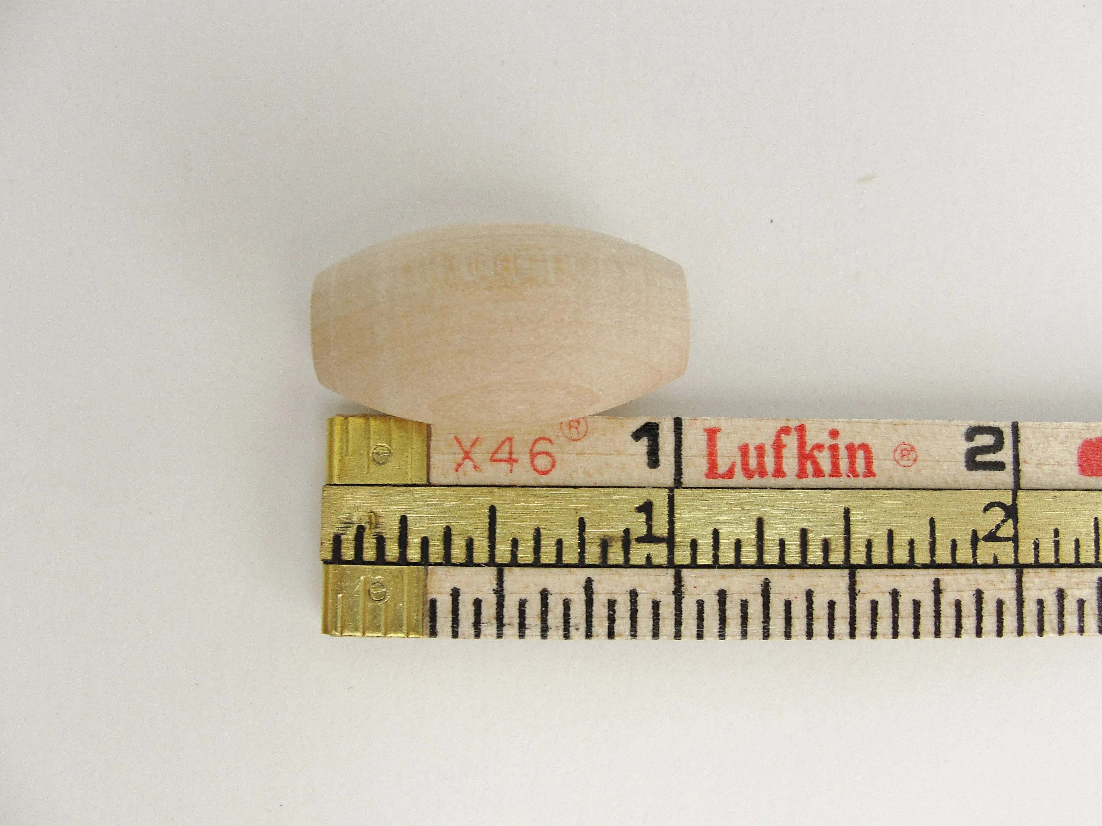 Wooden oval beads 1" x 9/16" with a 3/16" hole